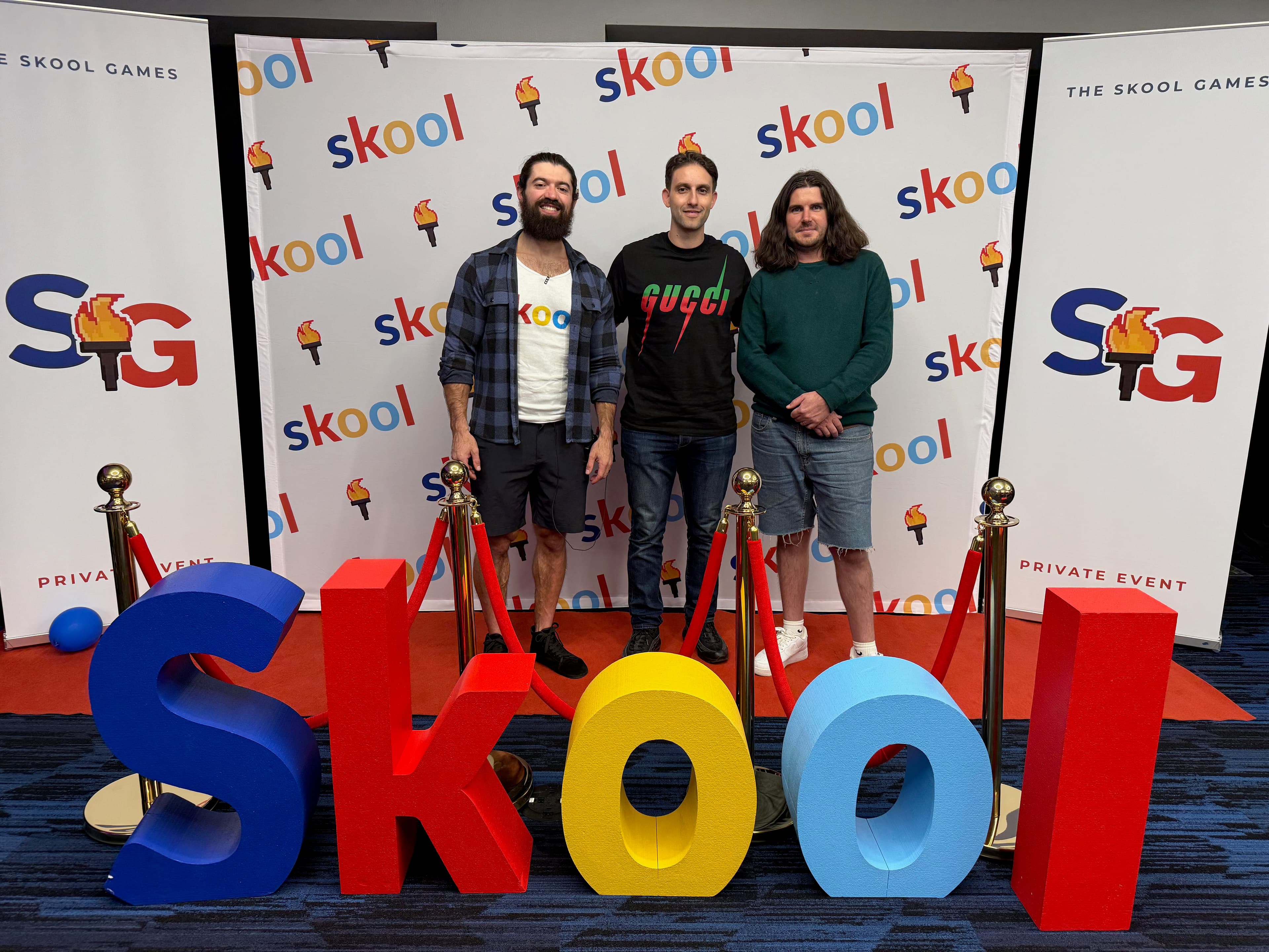 Adnan Pilditch with Alex Hormozi and Sam Ovens at the Skool Games in Las Vegas